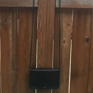 Authentic Chanel wallet on chain .